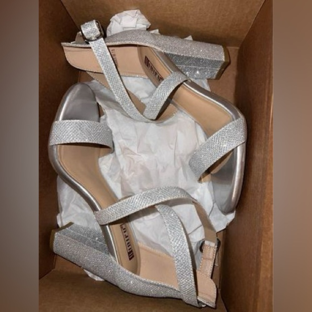 Women’s silver heels.